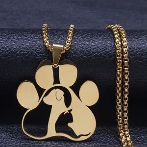 Whimsical carved pet paw necklace, 22", black, silver, gold. 316L